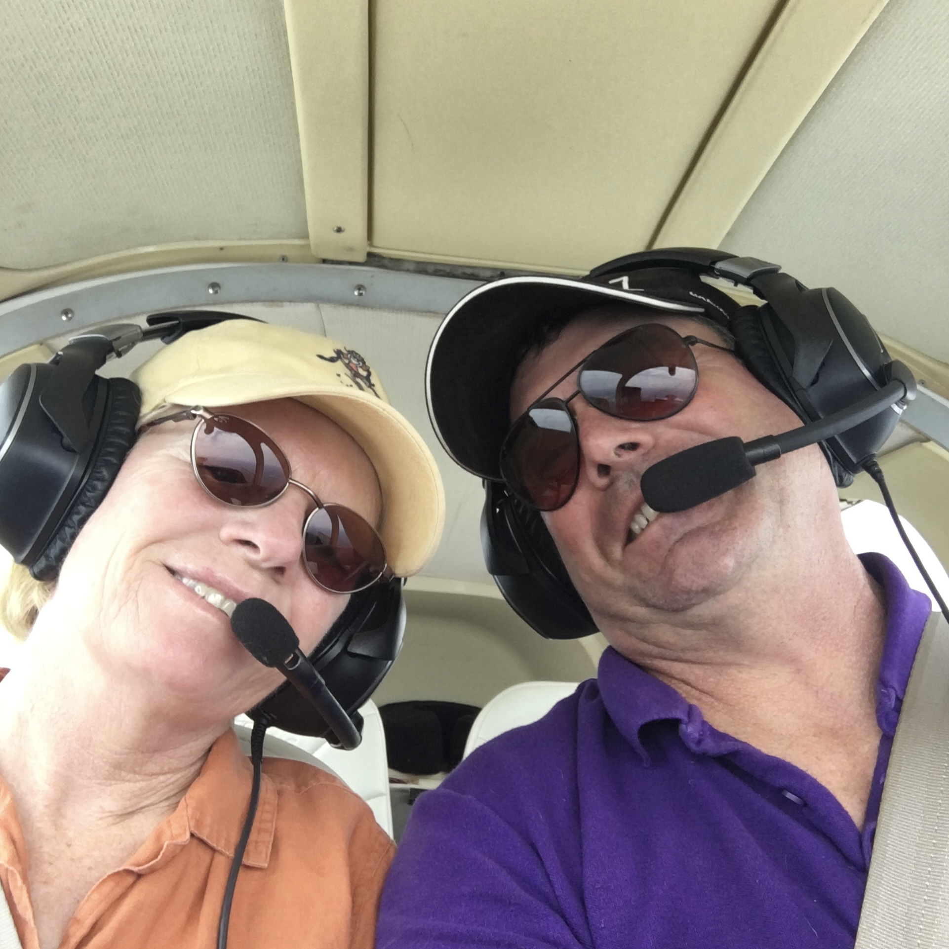 Jeff and Sue Johnson flying their Grumman Tiger N1595R following a modern avionics panel modernization featuring dual AV-30 displays and a Trio Certified Autopilot
